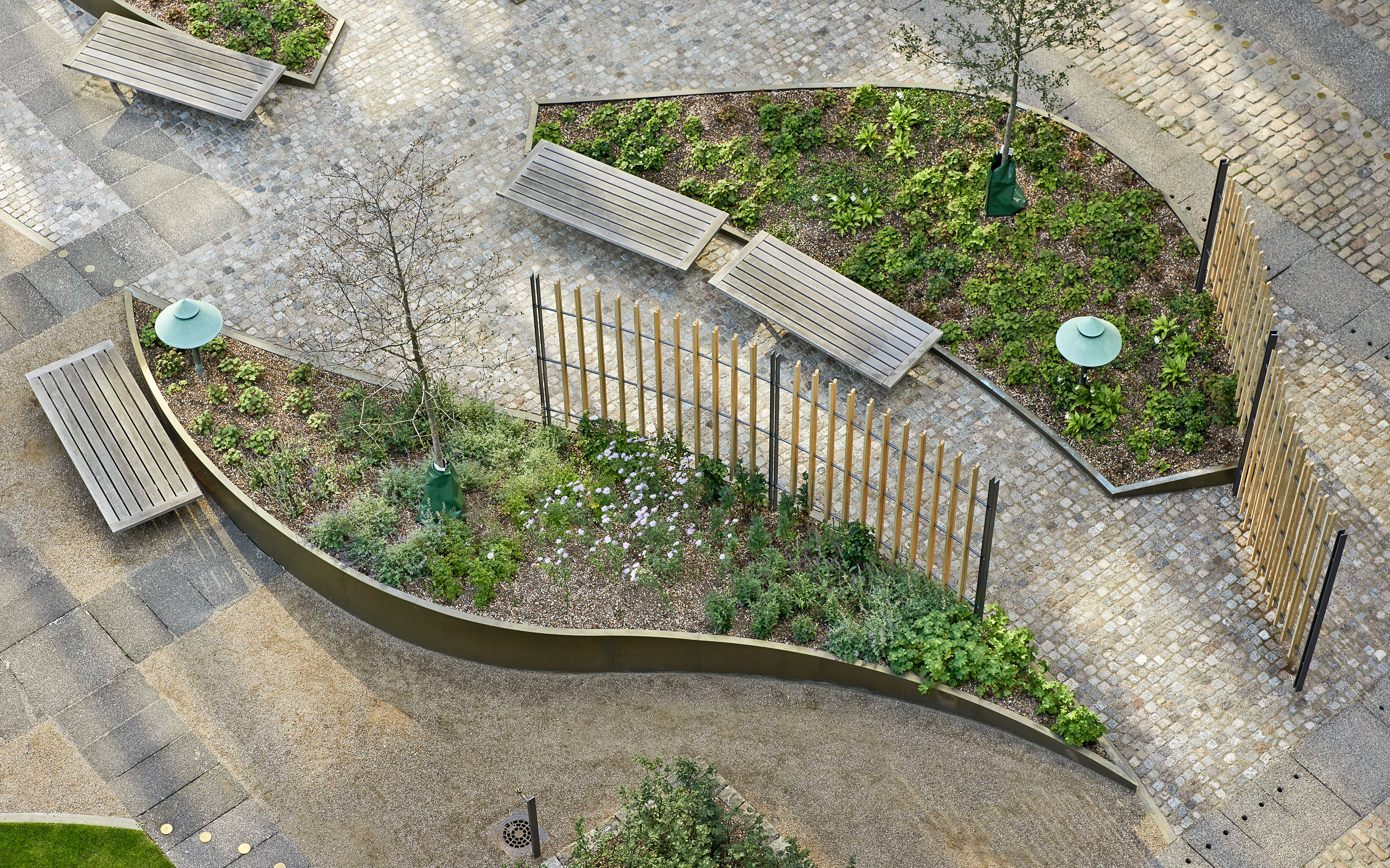 Walkways with benches and plant beds